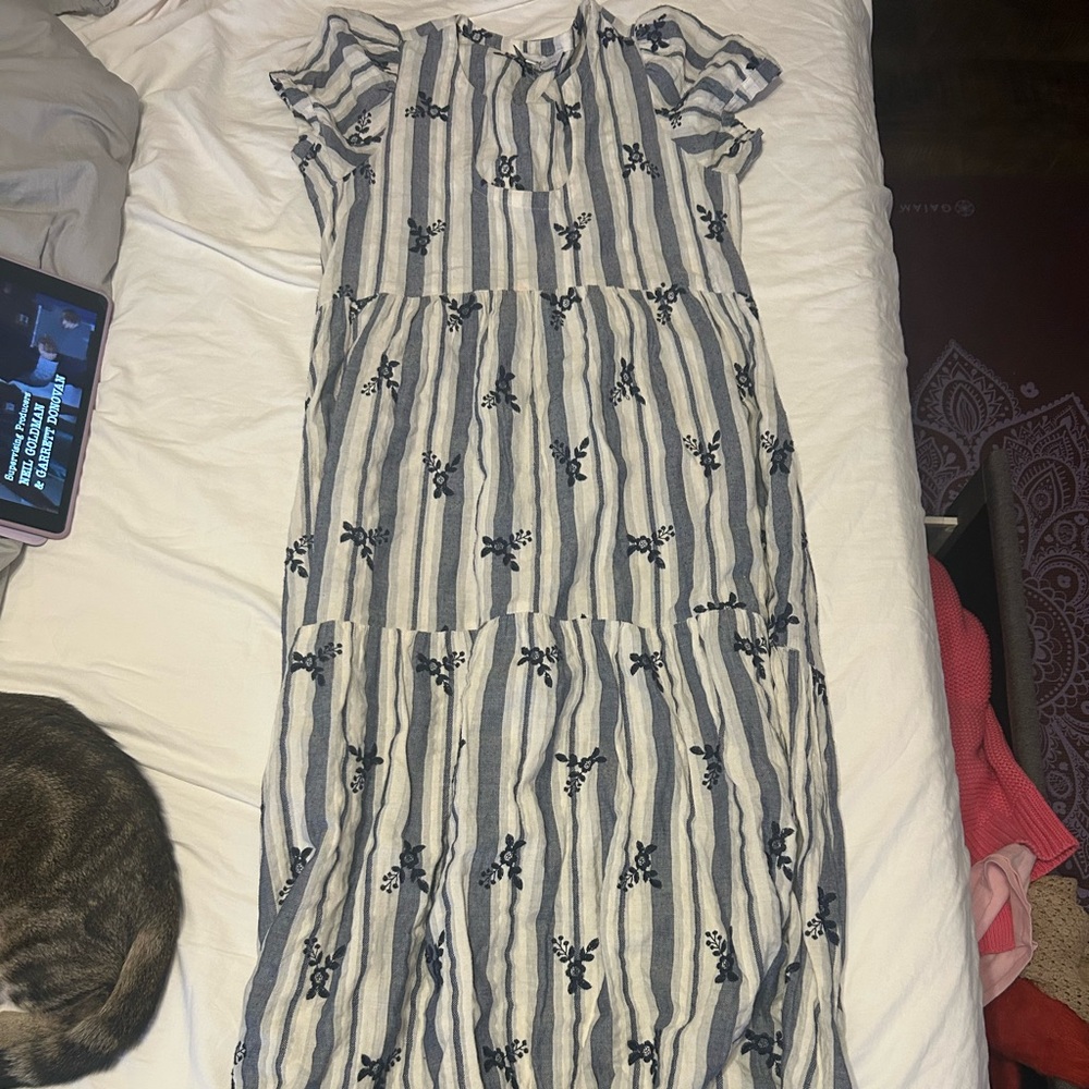 Elegant Striped Maxi Dress with Floral Accents